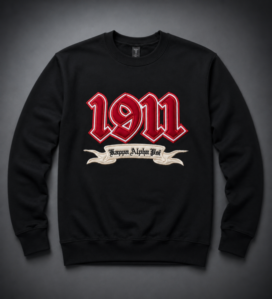 Custom black crewneck sweatshirt with oversized dimensional crimson old English founding year appliqué and cream banner scroll with organization name below.
