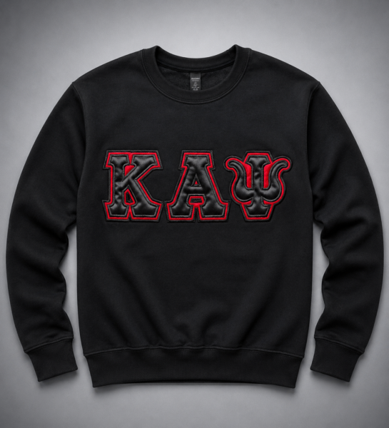 Custom black heavyweight crewneck sweatshirt with oversized tonal satin Greek letter appliqué, black inner outline, and crimson embroidered border on chest.