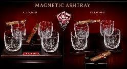 Set of cut-crystal whiskey cigar glasses with magnetic ashtray attachments and cigars on a dark backdrop