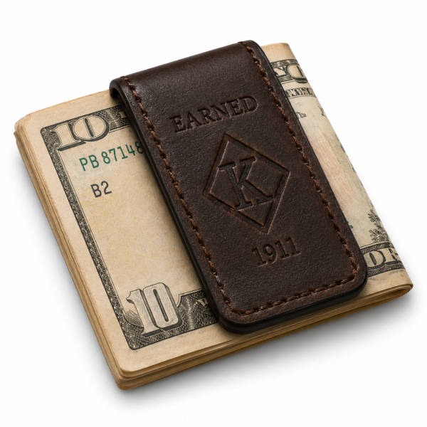 Earned espresso leather money clip holding folded currency
