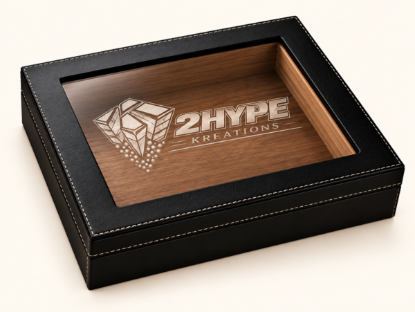 Black glass-top humidor with wood-lined interior engraved with the 2HypeKreations logo