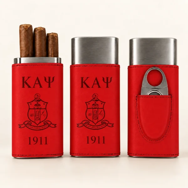 Three red Kappa Alpha Psi leather cigar travel cases with crest, one holding cigars and one with a built-in cutter
